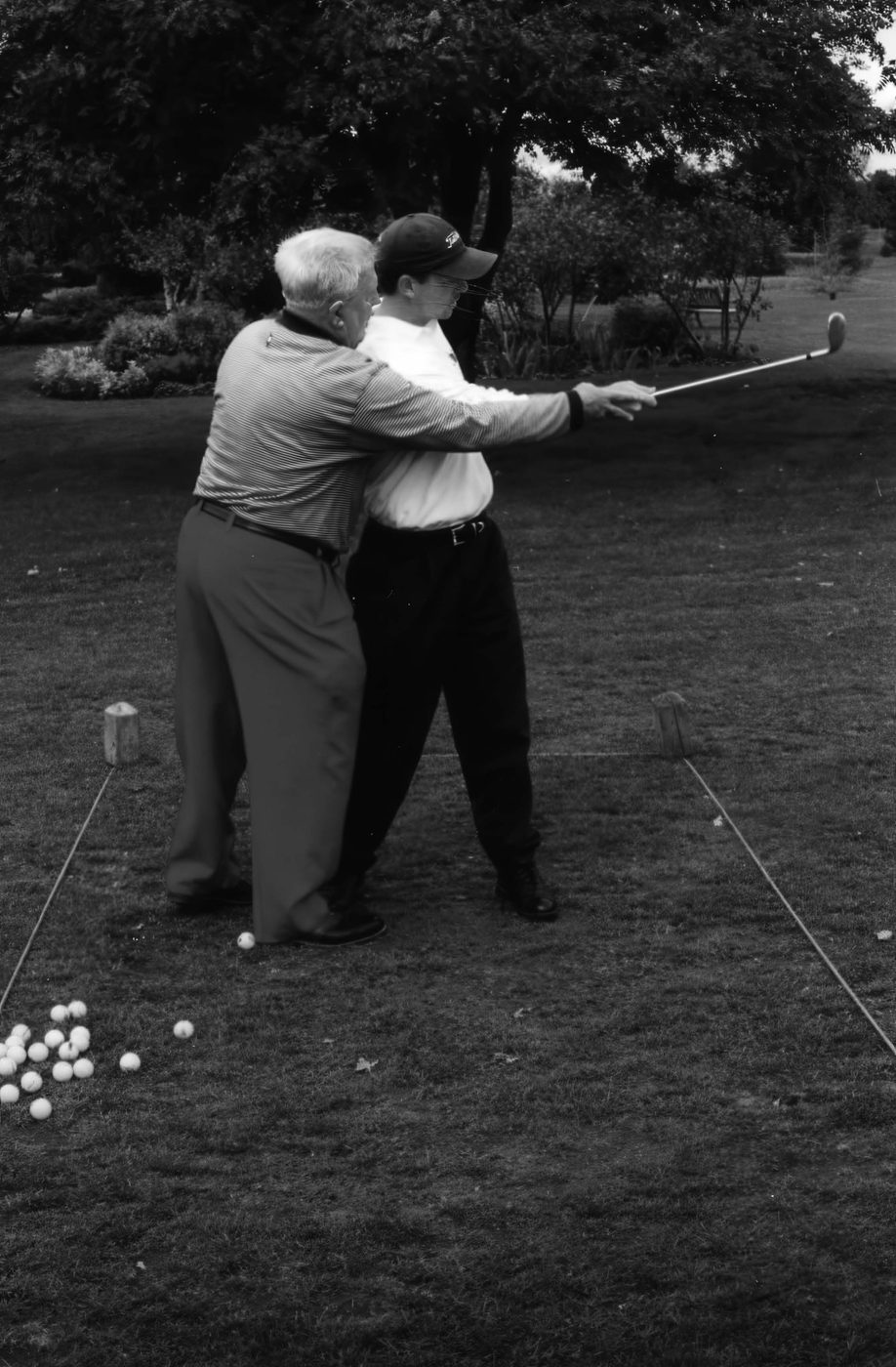 Moe Norman teaching Todd Graves.